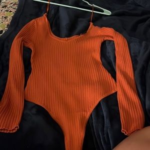 Burnt orange almost red bodysuit